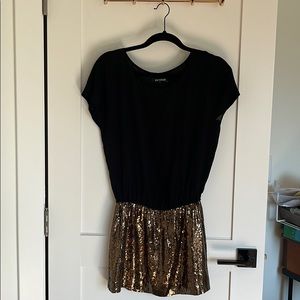 Black and gold sequin dress